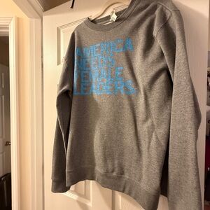 RAYGUN Gray Crewneck Sweatshirt “America Needs Female Leaders”